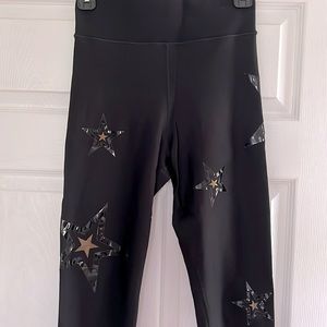 Ultracor Black Legging with gold/black stars size Large
